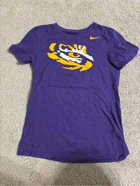 LSU TIGERS Nike Purple Short-Sleeve Tee with Yellow Tiger Eye Graphic
